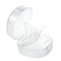Clear plastic case with a small silicone nipple shields inside on a white background