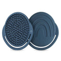 Dark blue silicone shampoo brush with soft silicone bristles 