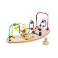 Wooden bead maze toy with colorful strings on a white background
