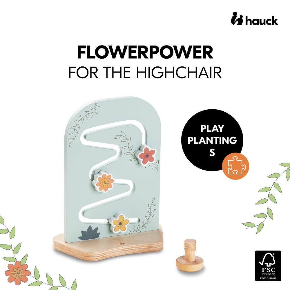 Highchair toy with floral design and 'hauck' branding on a white background