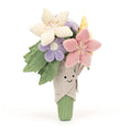 Jellycat boquet of flowers soft toy against white bakground.