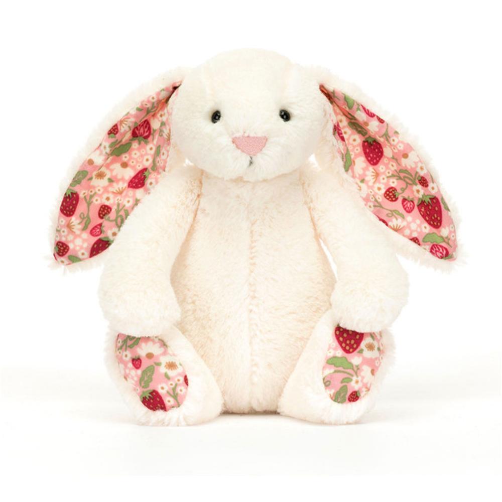 White Jellycat Bunny with pink and red floral ears against white background.