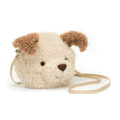 Cream and brown Jellycat puppy bag against white background.