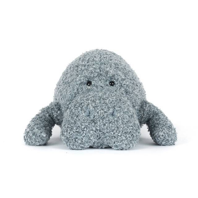 Grey manatee Jellycat soft toy against white background.