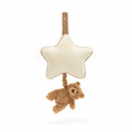 Jellycat white star musical pull with small brown bear attached against white background.