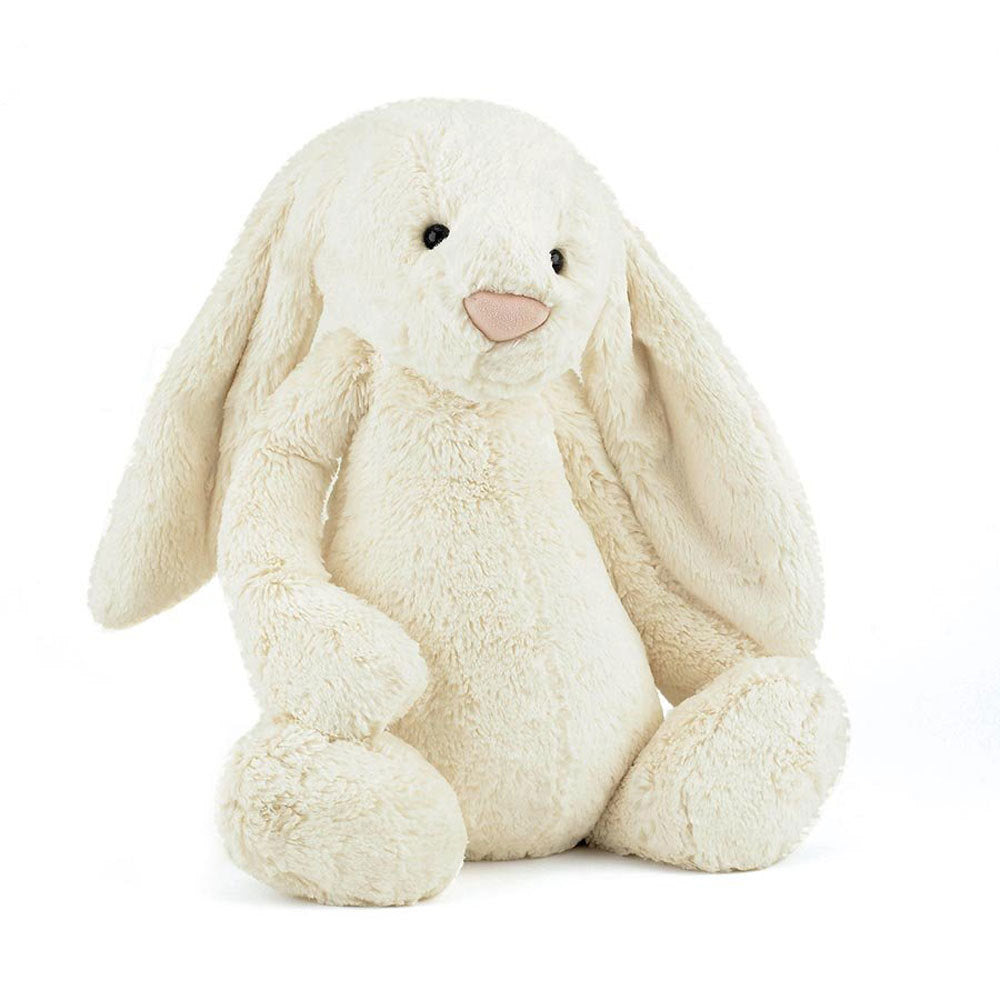 Cream Jellycat bunny soft toy sitting against white background.