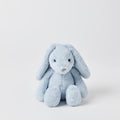 Blue plush bunny toy on a light gray background