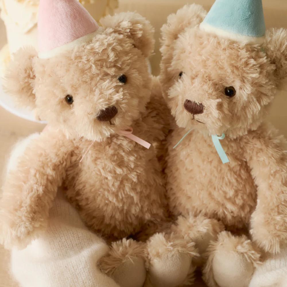 Jamie Kay ear soft toys sitting next to eachother.