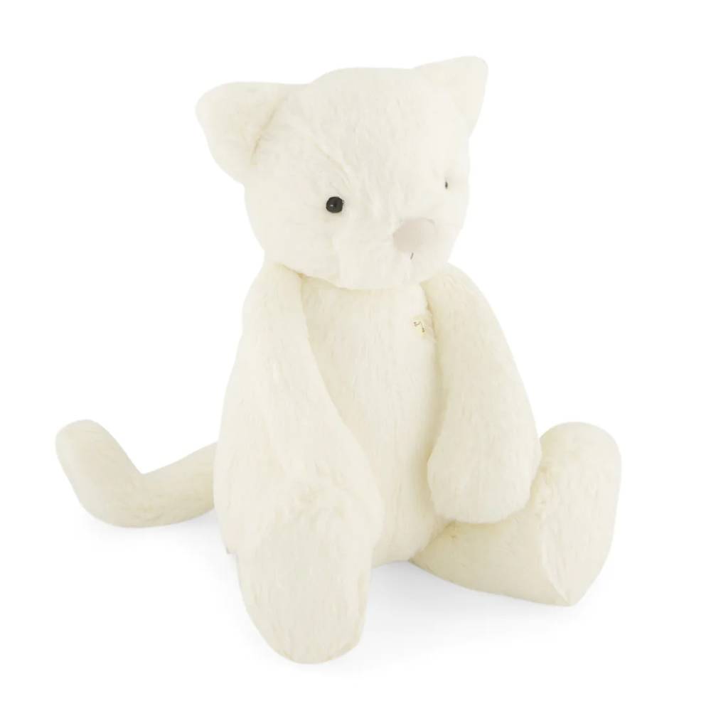 Cream Jamie Kay cat soft toy against white background.