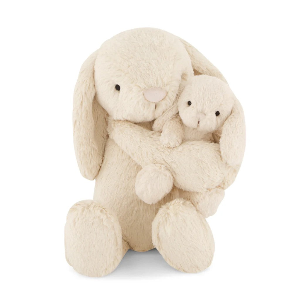 Beige Jamie Kay bunny soft toys against white background.