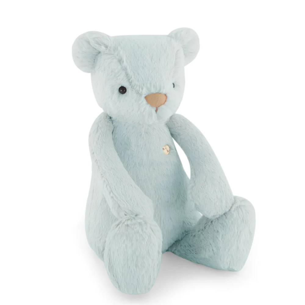 Blue Jamie Kay bear soft toy against white background.