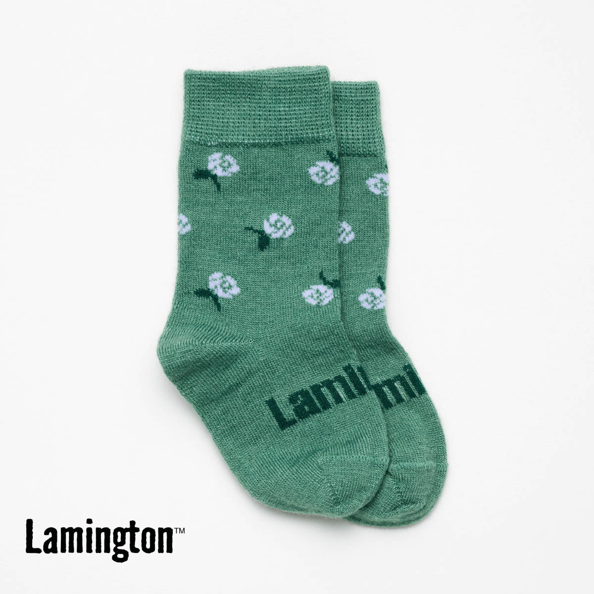 Green floral crew merino socks on a white background