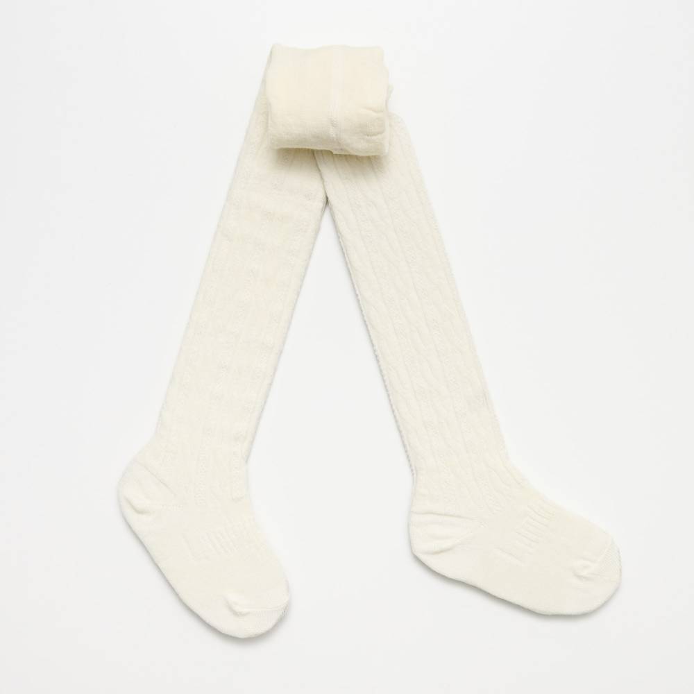 Cream Cable merino Tights on a white background