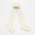 Cream Cable merino Tights on a white background