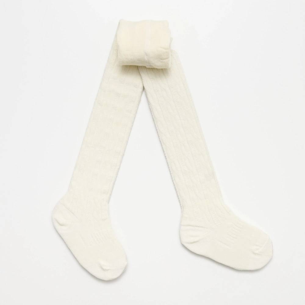 Cream Cable merino Tights on a white background