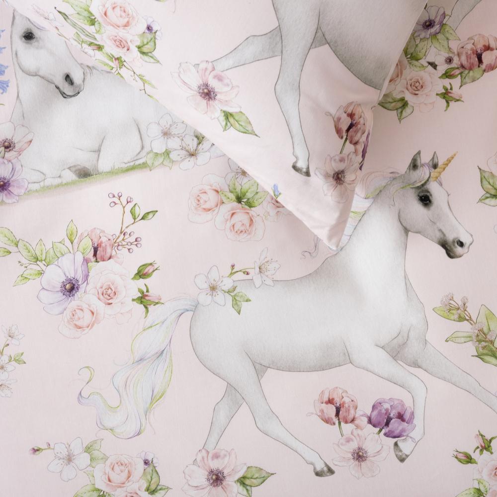 A close up shot of the unicorn print duvet colour and matching pillowcase.