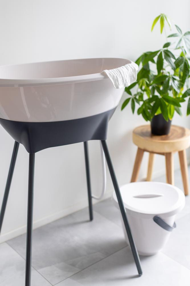 LUMA Baby Bath sitting on LUMA Baby Bath Stand. 
