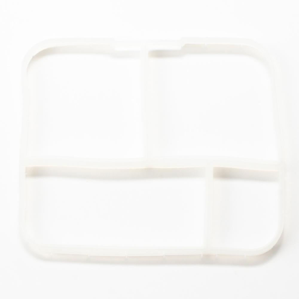 White rectangular silicone lunchbox insert on a white background