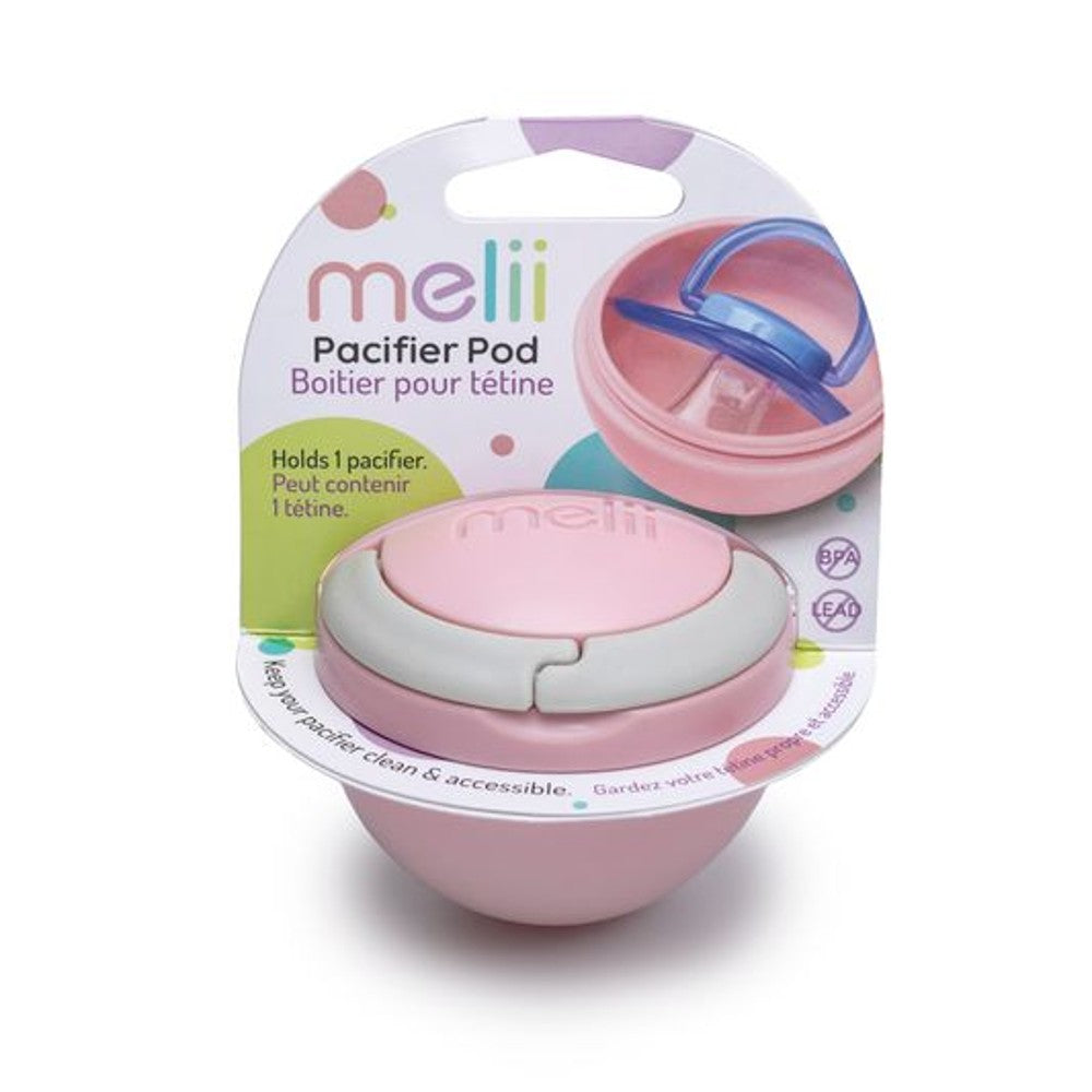 Pink pacifier pod with packaging on a white background