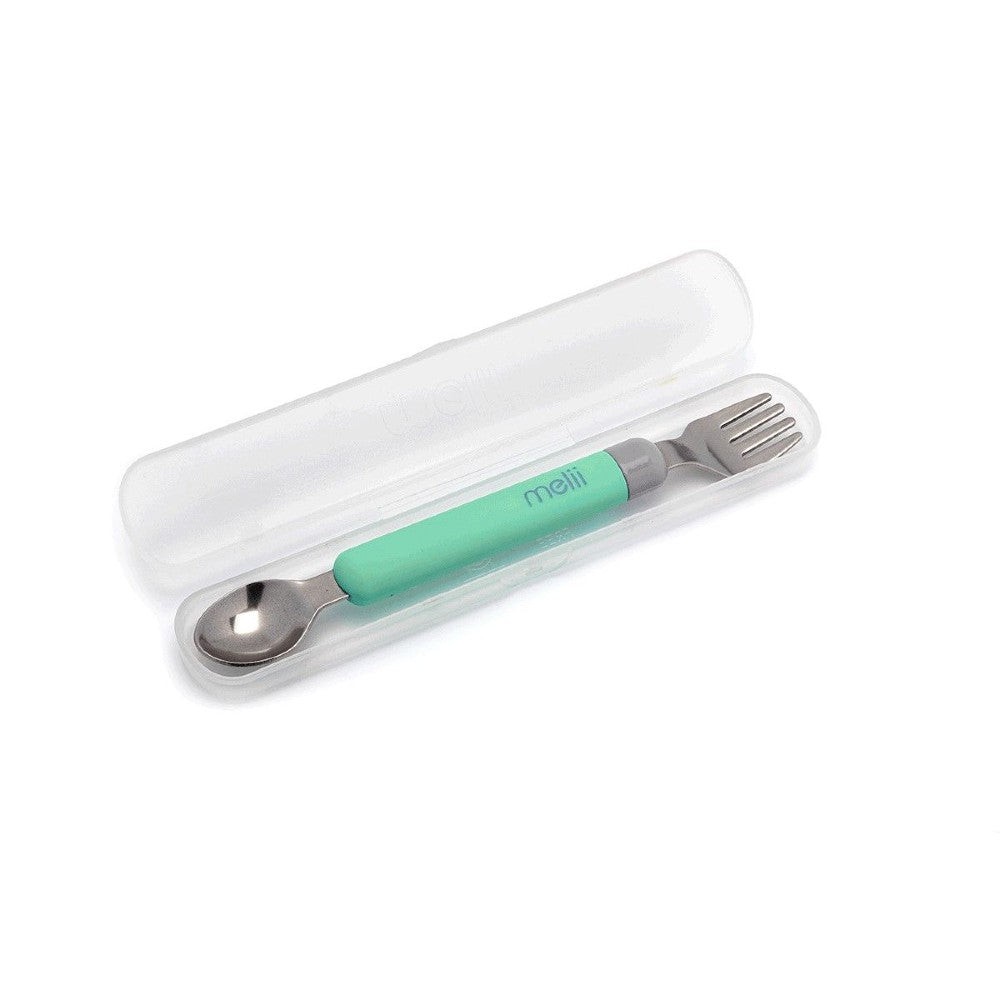 Mint green spoon and fork set in a clear case on a white background