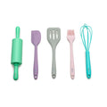 Set of colorful children's kitchen utensils including a rolling pin, spatula, brush, and whisk on a white background.