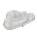 White baby drying rack and draining board with bristles on a white background