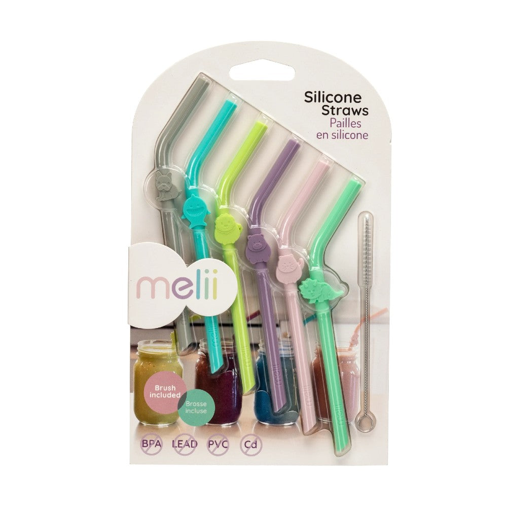 Packaged silicone straws with colorful designs on a white background