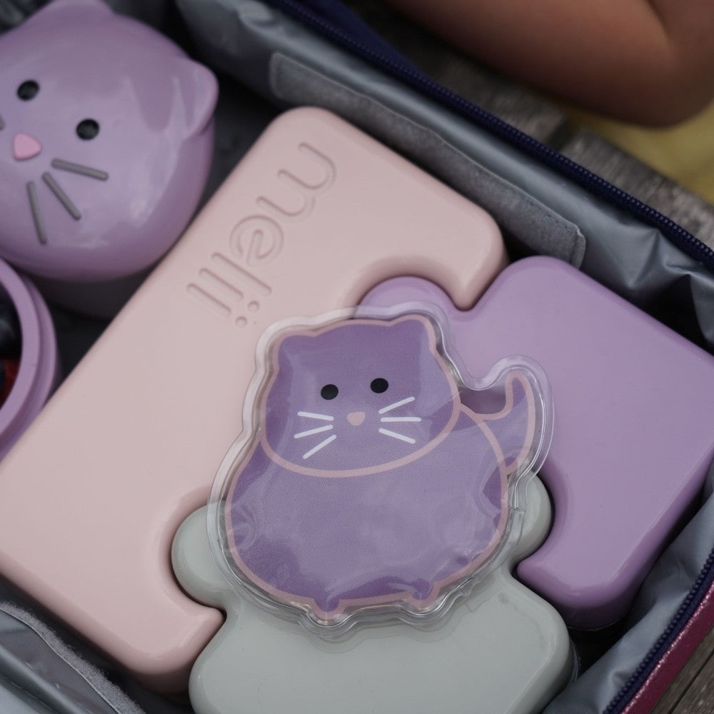 Set of purple cat-themed containers with a visible brand name, arranged in an open lunch bag
