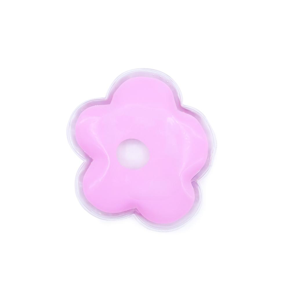 Pink flower-shaped object on a white background