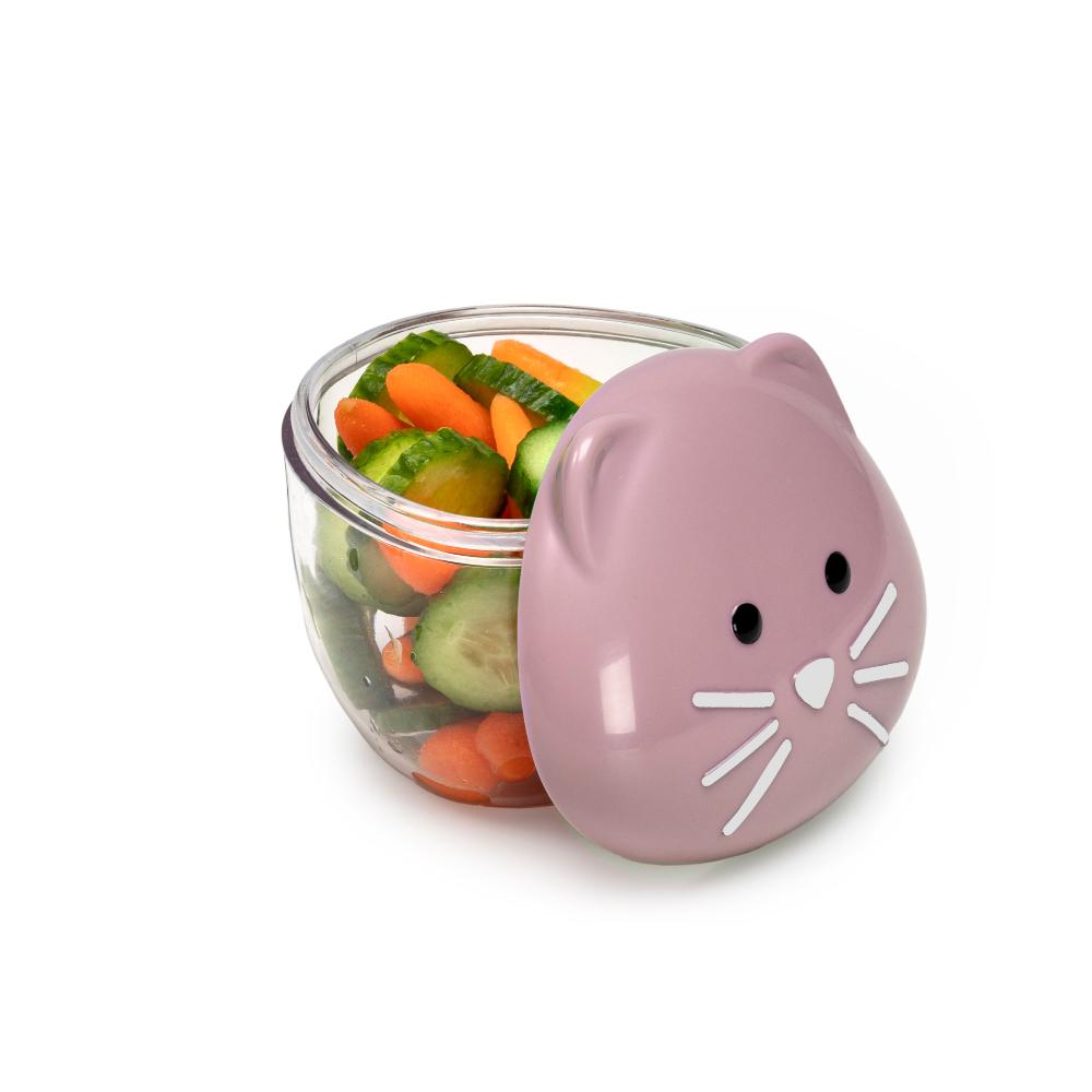 Glass jar with a pink cat-shaped lid containing small vegetables on a white background
