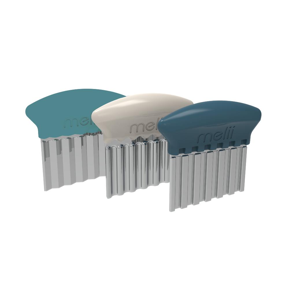 Three stainless seteel food slicers with different colored handles on a white background