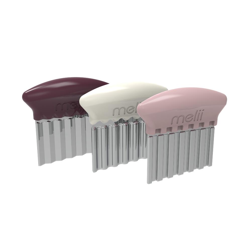 Three stainless seteel food slicers with different colored handles on a white background