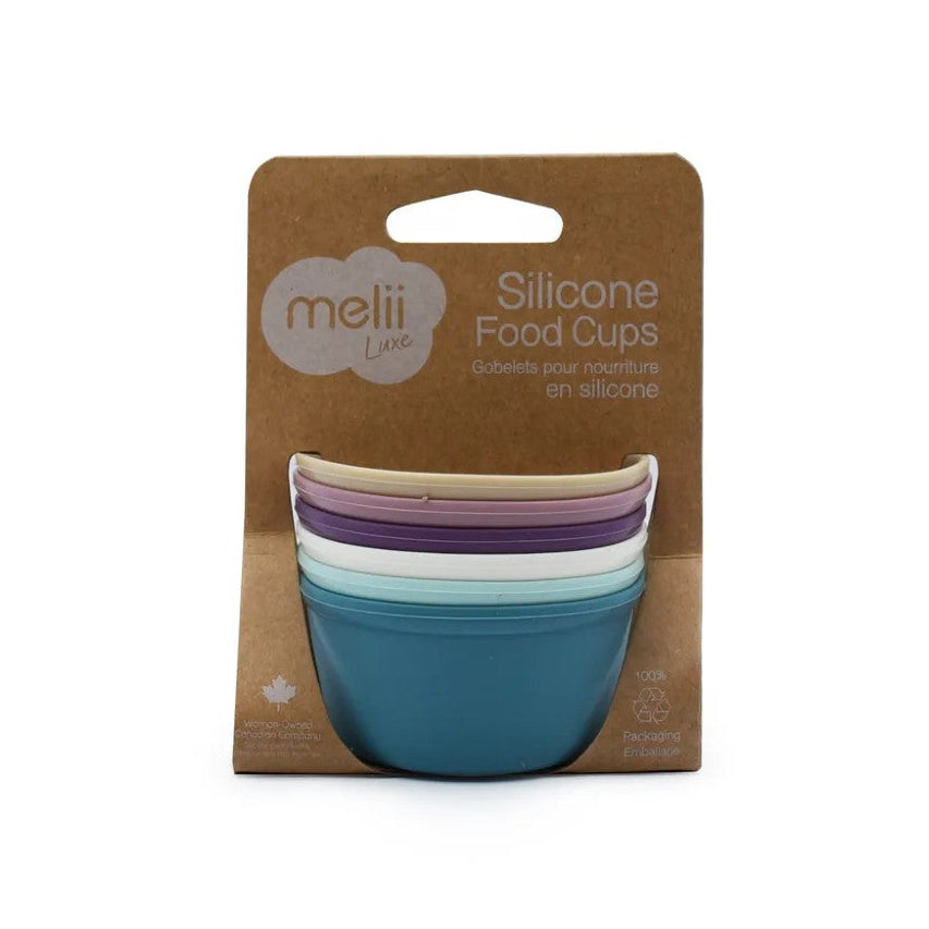 Packaging of silicone food cups with a brown backing and 'meli' branding.