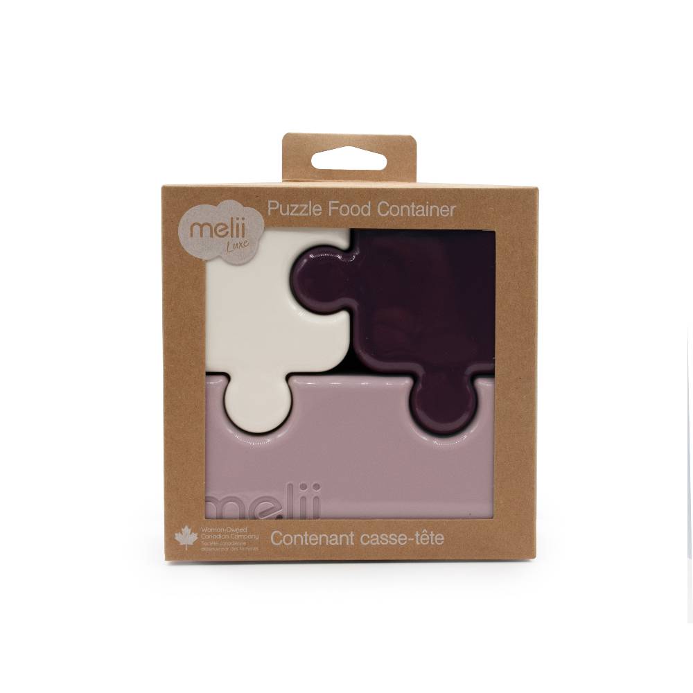 Puzzle shaped bento food container packaging with 'mellii' branding on a white background