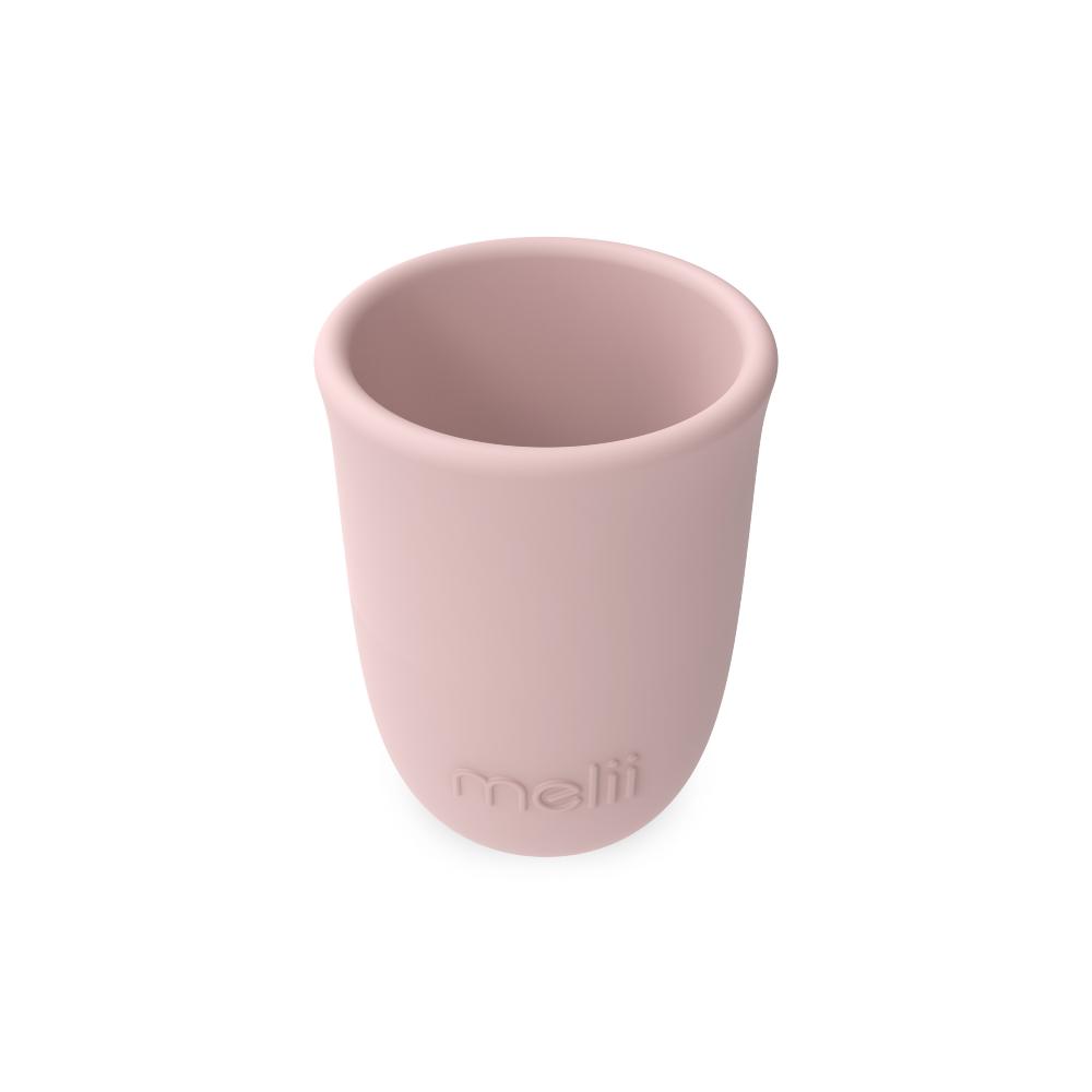 Pink cup with 'mali' branding on a white background