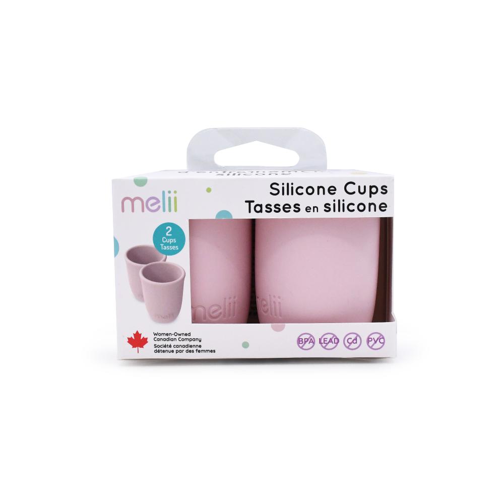 Packaging of pink silicone cups with 'mellii' branding on a white background