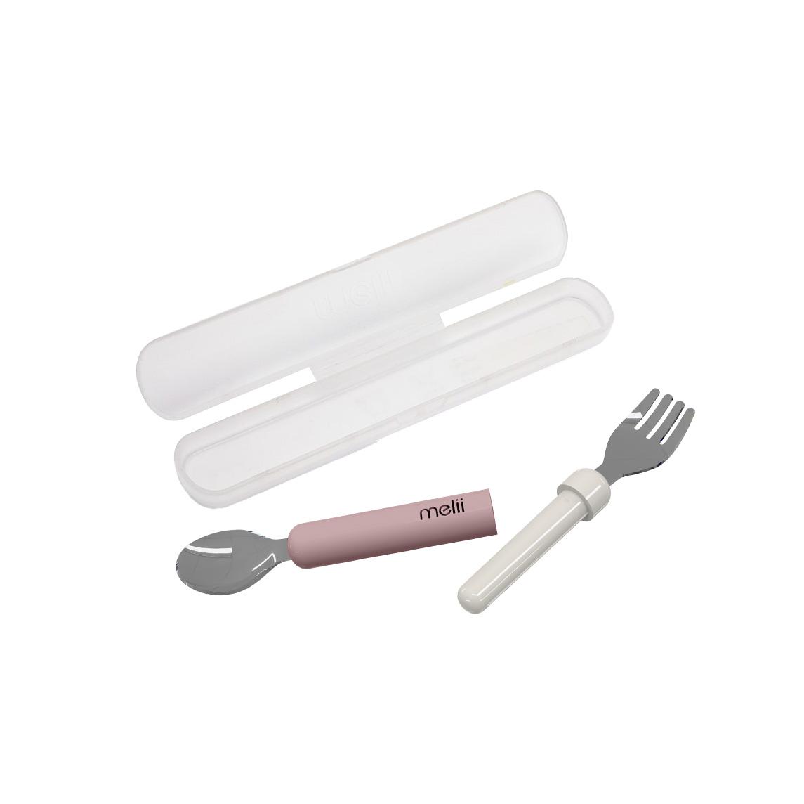 Set of cutlery including a fork and spoon with pink handle and white handle, in a white case on a white background.