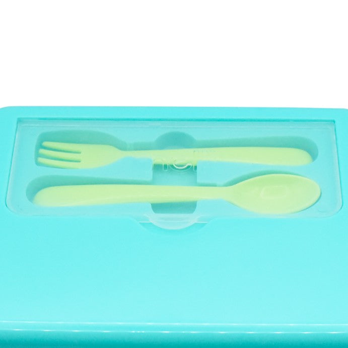Green fork and spoon set in a clear plastic case on a turquoise background
