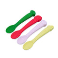 4 silicone spoons with fruit and veges theme handles, on a white background. 