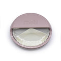 Pink spin snack box with white interior and 'melii' branding on a white background