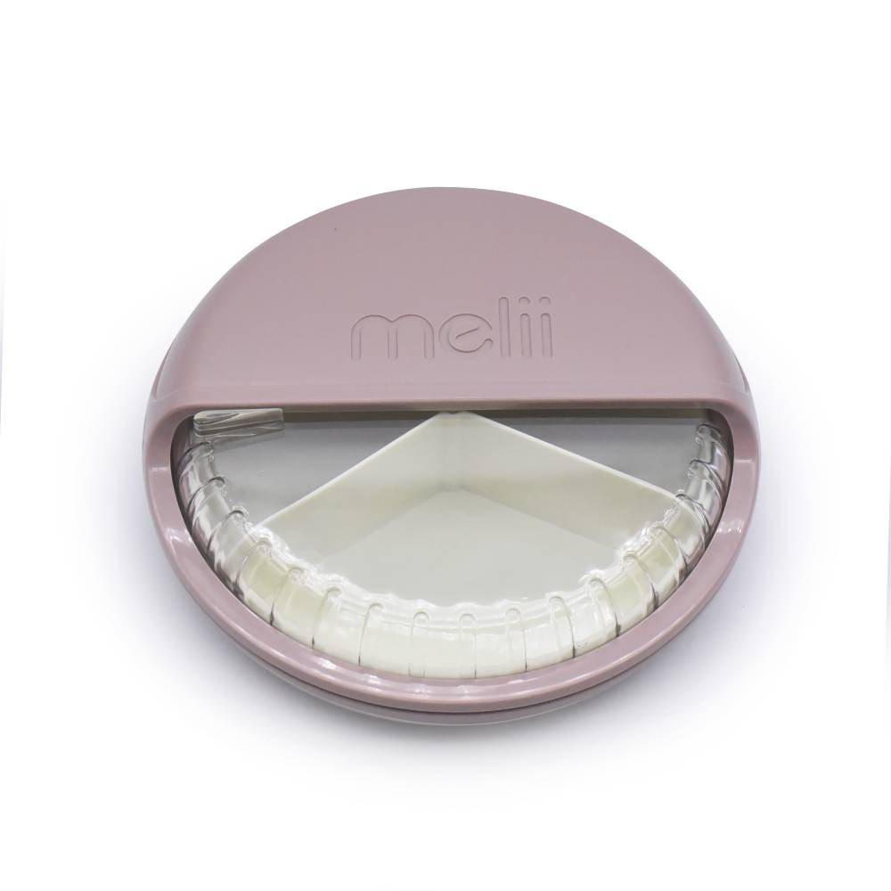 Pink spin snack box with white interior and 'melii' branding on a white background