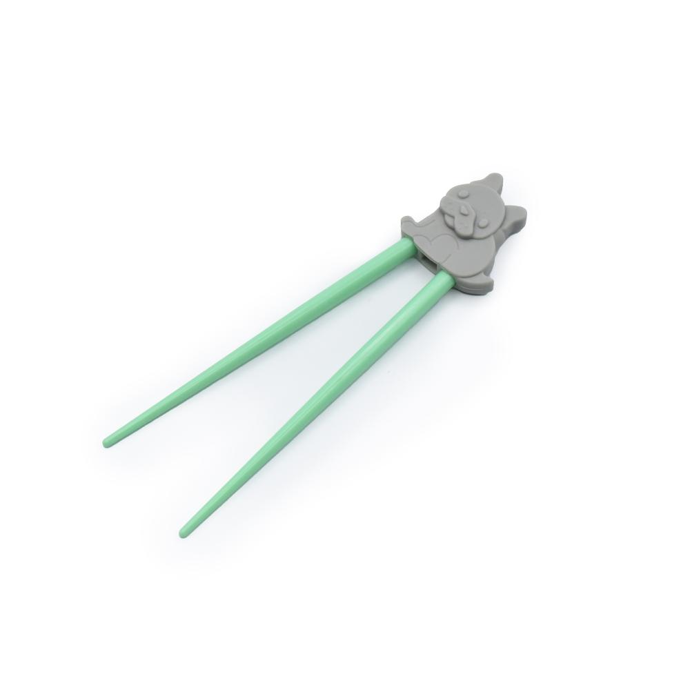 Green children's learning chopsticks with a gray panda-shaped holder on a white background