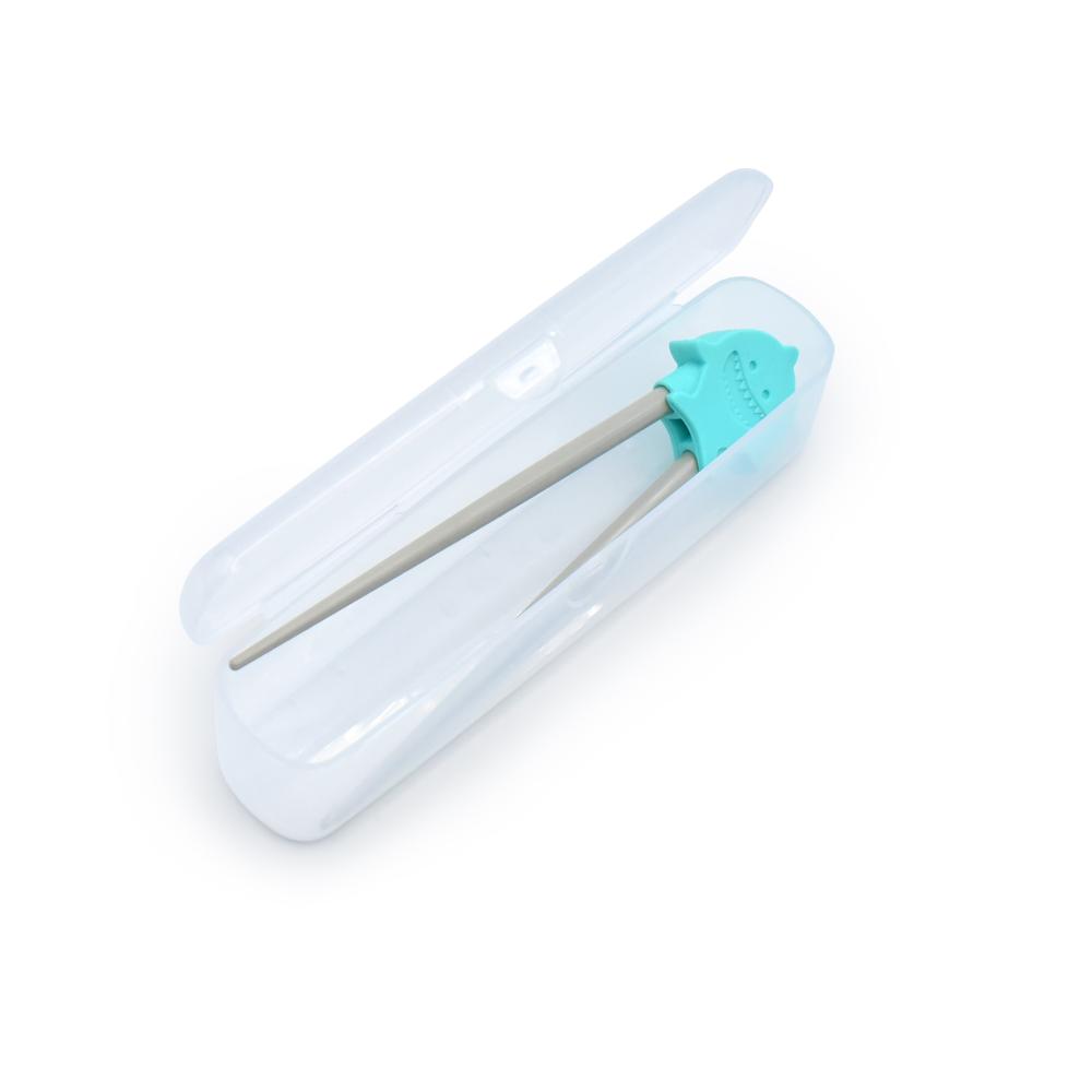 Chidlren's learning chopsticks with shark  in a clear plastic case on a white background
