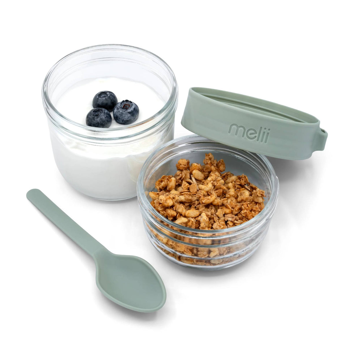 Glass Yoghurt Container with Spoon - Sage, with yoghurt in one side and granola in the other. 