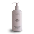 Mushie baby body lotion bottle on a white background