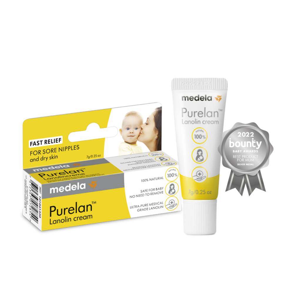 Medela Purelan lanolin cream shown with its retail box and a single white tube, alongside a gray 2022 bounty badge, on a plain white background.
