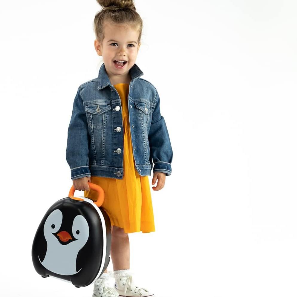 Child holding My Carry Potty against white background.