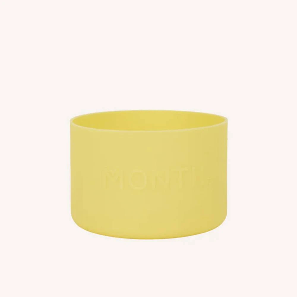 Yellow silicone drink bottle bumper on white background