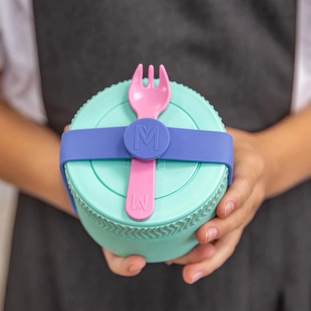Mint green insulated jar with pink spork and child holding
