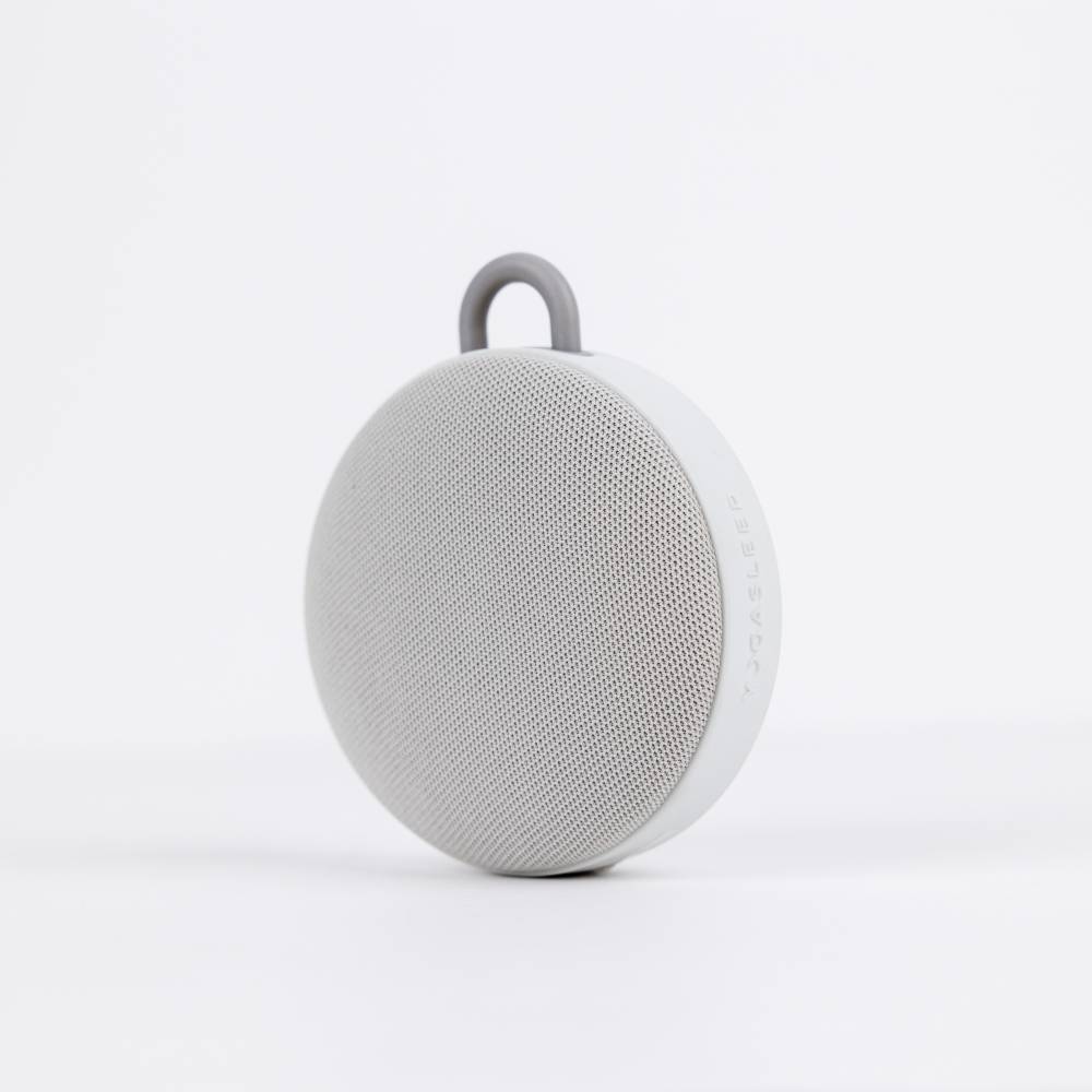 Grey baby soother white noise machine on a white background